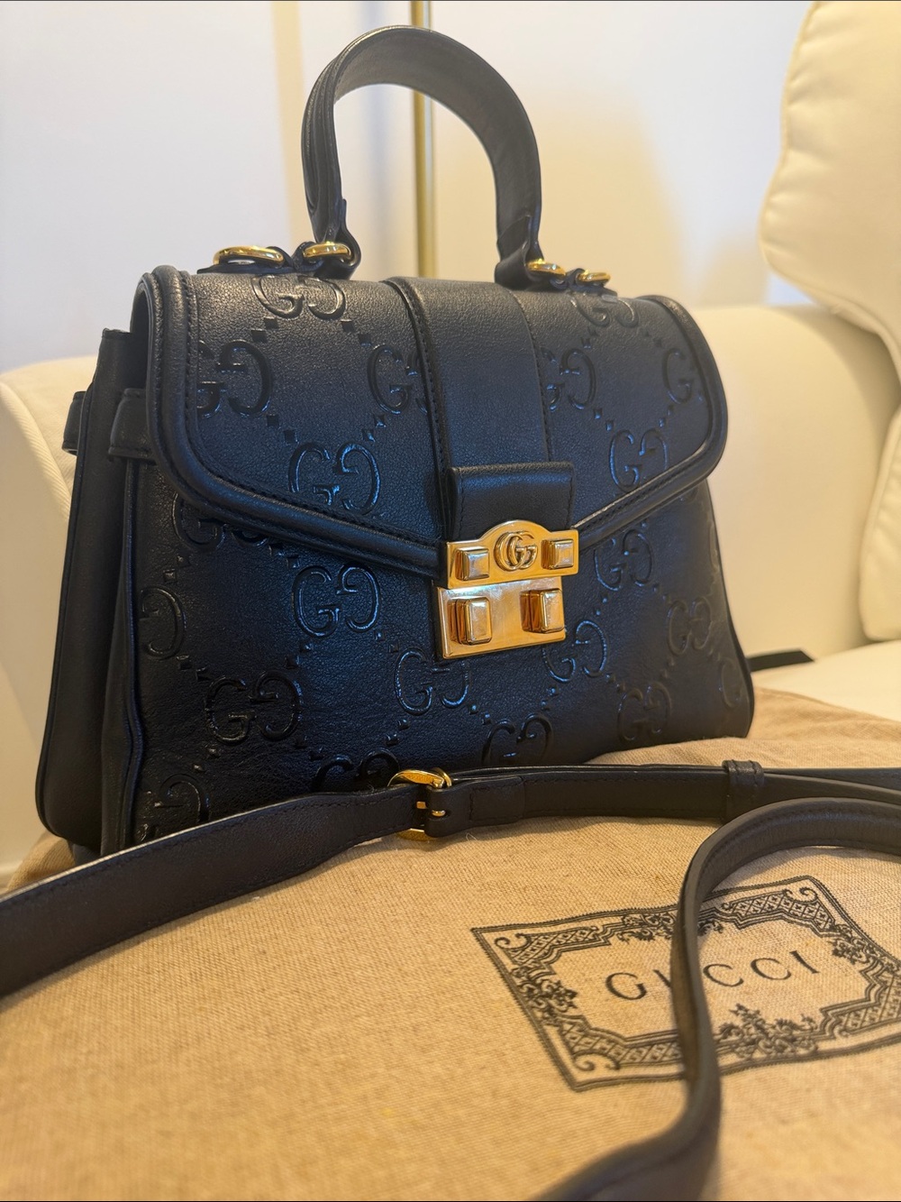 Gucci Small Black GG Embossed Leather Top-Handle Bag with Gold Hardware